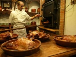 Aprende a asar lechazo en un pueblo de Segovia